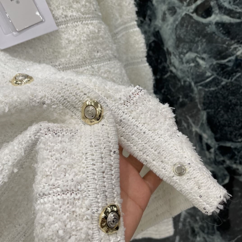 Ch**el sweaters
